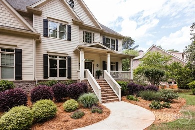Set on a generous .68-acre lot with access to 15 acres of green - photo 4
