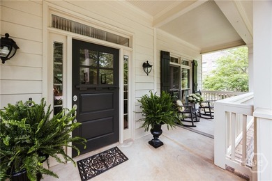 Set on a generous .68-acre lot with access to 15 acres of green - photo 5
