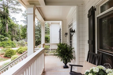 Set on a generous .68-acre lot with access to 15 acres of green - photo 6