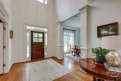Set on a generous .68-acre lot with access to 15 acres of green - photo 7