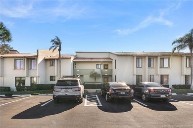 Second Floor 1/1.5 Condo with golf course views in Miles Grant - photo 1