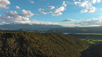 Perched over the breathtaking Uncompahgre Valley, and peering - photo 4