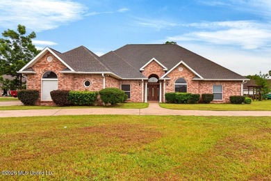 Stunning all-brick waterfront home on an expansive corner lot - photo 1