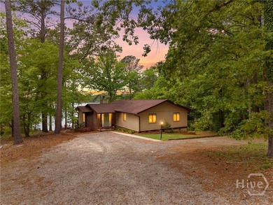 Welcome to Sunset Cove, a stunning 3 bedroom, 3 bath lakefront - photo 1