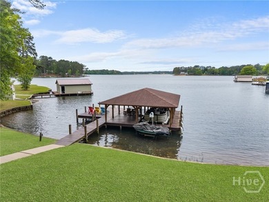 Welcome to Sunset Cove, a stunning 3 bedroom, 3 bath lakefront - photo 2