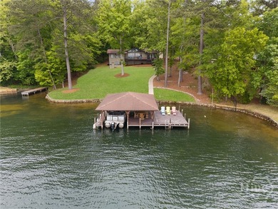 Welcome to Sunset Cove, a stunning 3 bedroom, 3 bath lakefront - photo 3
