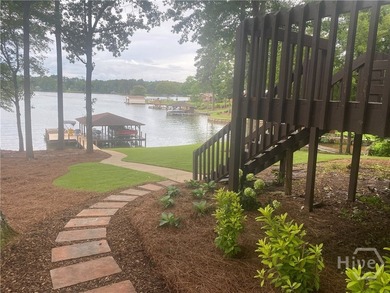 Welcome to Sunset Cove, a stunning 3 bedroom, 3 bath lakefront - photo 4