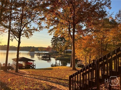 Welcome to Sunset Cove, a stunning 3 bedroom, 3 bath lakefront - photo 8