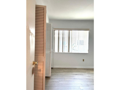 SPACIOUS, VACANT CORNER UNIT IN A DESIRABLE 55+ COMMUNITY. JUST - photo 7