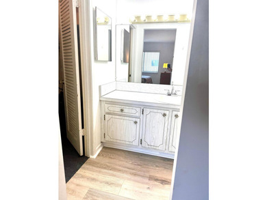 SPACIOUS, VACANT CORNER UNIT IN A DESIRABLE 55+ COMMUNITY. JUST - photo 10