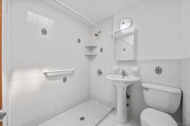 Welcome to this solid brick two-family home in the popular - photo 13
