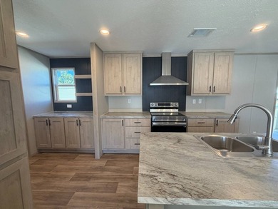 Beautiful move-in ready 4 bedroom, 2 bathroom home located in - photo 1