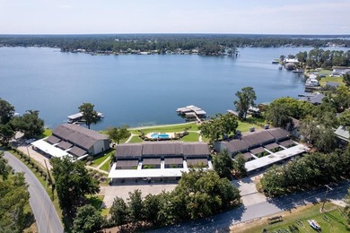 Wake up to peaceful lake views in this Beautifully Maintained - photo 1