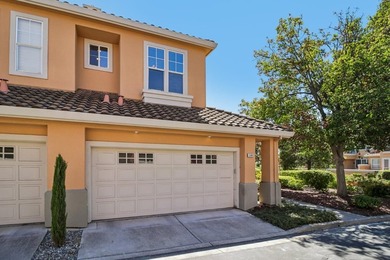 Rarely available, this townhouse-style condo is inside the - photo 3