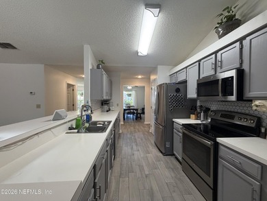 Welcome home to this beautifully maintained 4-bedroom, 2-bath - photo 10