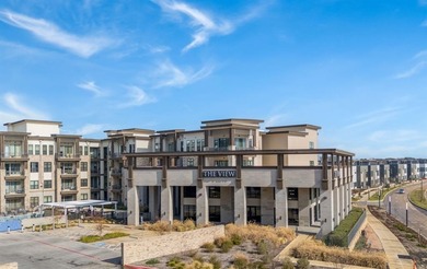 This beautifully designed first-floor condo offers a refined