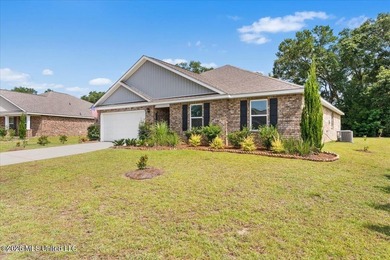 Beautifully maintained 4-bedroom, 2-bath home conveniently - photo 2