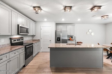 Beautifully maintained 4-bedroom, 2-bath home conveniently - photo 9