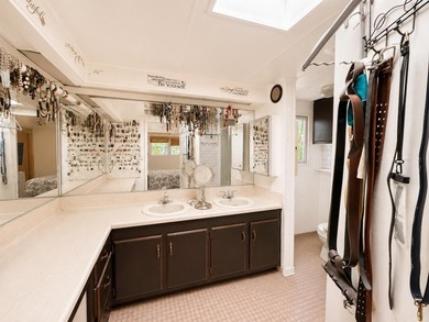 A spacious 2-bedroom, 2-bath mobile home located in the - photo 8