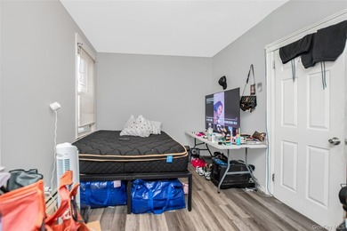 Welcome to this beautiful legal two-family home located in the - photo 11