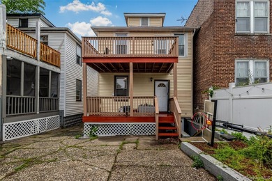 Welcome to this beautiful legal two-family home located in the - photo 19