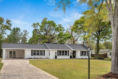 Beautifully remodeled and move-in ready, this exceptional - photo 1