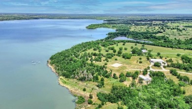 Nestled along the shores of Lake Ray Roberts, this 35-acre - Lake Home For Sale in Valley View, Texas