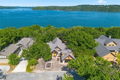 Remarkable Beaver Lake living in this custom built lake home - photo 1