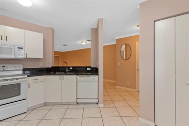 Lovely 3 bedroom, 2.5 bathroom townhome located in the 24 hour - photo 3