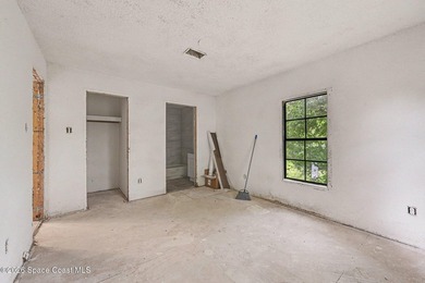 Situated on a FULL ACRE in lovely North Merritt Island, this - photo 12