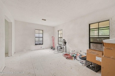 Situated on a FULL ACRE in lovely North Merritt Island, this - photo 13