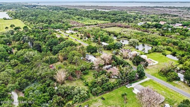 Situated on a FULL ACRE in lovely North Merritt Island, this - photo 21
