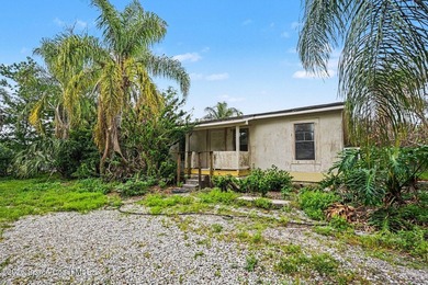 Situated on a FULL ACRE in lovely North Merritt Island, this - photo 22
