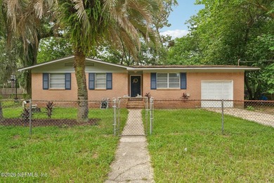 Welcome home to this beautifully updated 3-bedroom, 2-bath brick - photo 1