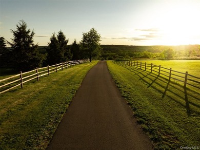 Welcome to Sunset Ridge Farm. A discreet tree-lined drive with - photo 3