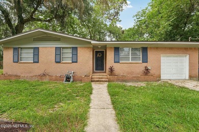 Welcome home to this beautifully updated 3-bedroom, 2-bath brick - photo 3