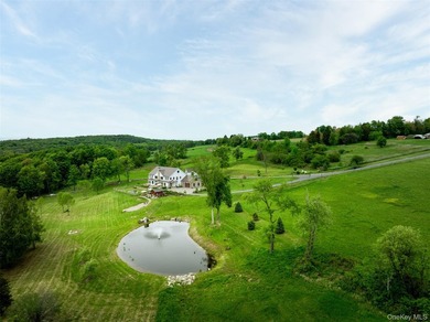 Welcome to Sunset Ridge Farm. A discreet tree-lined drive with - photo 4