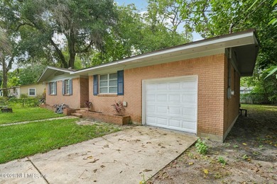 Welcome home to this beautifully updated 3-bedroom, 2-bath brick - photo 4