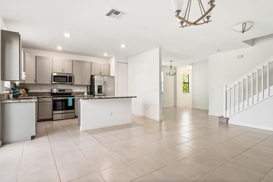 Welcome to this charming 4-bedroom, 3.5-bathroom townhouse in - photo 4