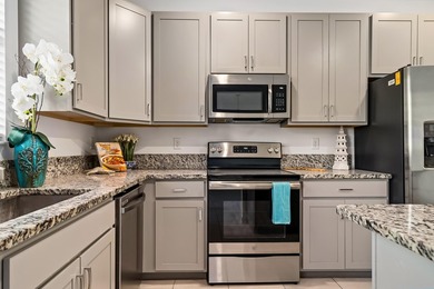 Welcome to this charming 4-bedroom, 3.5-bathroom townhouse in - photo 10