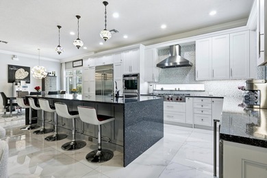 Experience the ultimate South Florida lifestyle in this highly - photo 2