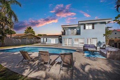 Tucked on an oversized double lot minutes from the beach, this 4 - photo 2