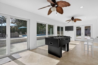 Tucked on an oversized double lot minutes from the beach, this 4 - photo 8
