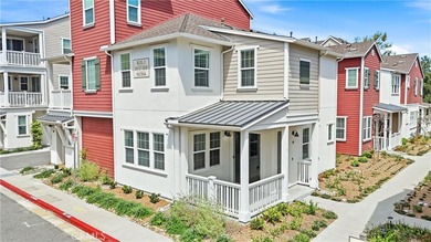 Welcome to this beautifully upgraded end unit townhome located - photo 1