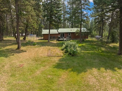 Nestled on a wooded 0.69-acre lot, this 1,560-square-foot - photo 31