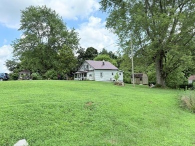This property is located in a private & secluded area. It has a - Lake Home For Sale in Munfordville, Kentucky