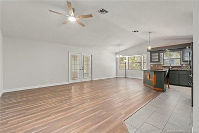 Country Cutie! Lovely 3 bed 2 bath lake front home situated on - photo 12