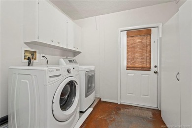 Country Cutie! Lovely 3 bed 2 bath lake front home situated on - photo 23