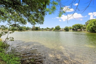 Country Cutie! Lovely 3 bed 2 bath lake front home situated on - photo 30