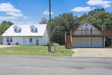 Looking for a lake house getaway? This newly renovated home has - Lake Home For Sale in New Concord, Kentucky